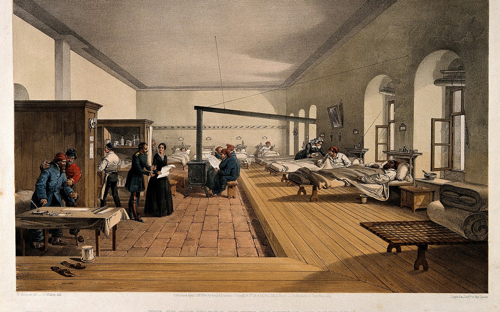 A long ward with windows down both walls and beds ranked between